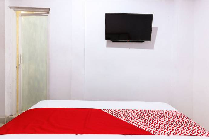 Imagen de la habitación del Hotel OYO 1118 Artomoro Family Guesthouse. Foto 5