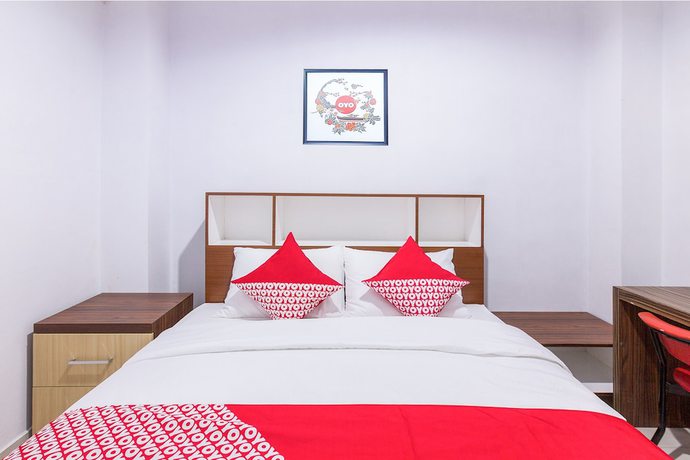 Imagen de la habitación del Hotel OYO 1118 Artomoro Family Guesthouse. Foto 7