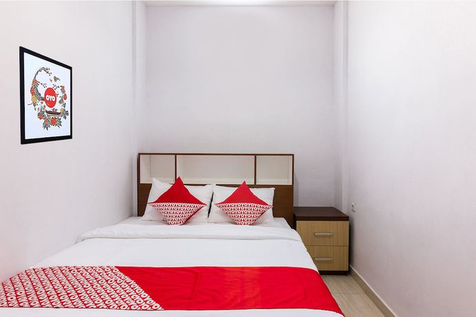 Imagen de la habitación del Hotel OYO 1118 Artomoro Family Guesthouse. Foto 8