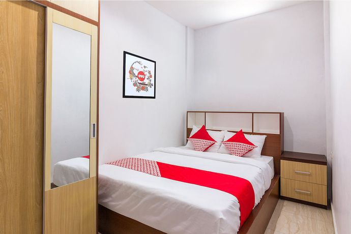 Imagen de la habitación del Hotel OYO 1118 Artomoro Family Guesthouse. Foto 14