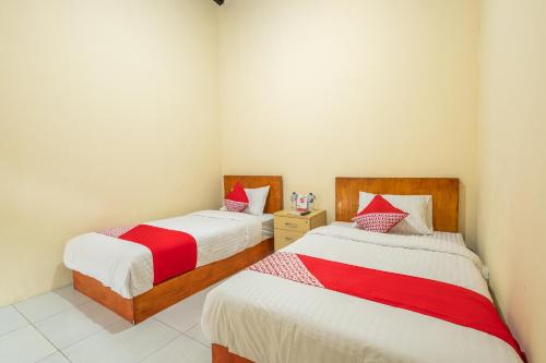 Imagen de la habitación del Hotel OYO 1120 Grand Liquid. Foto 6