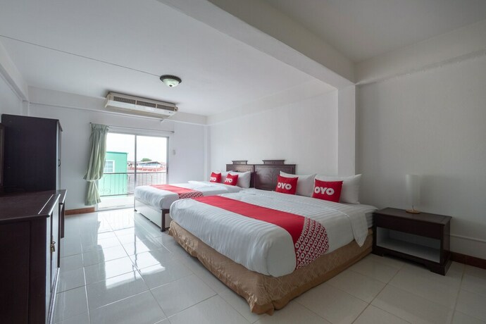 Imagen de la habitación del Hotel OYO 1123 The One Healthcare And Apartment. Foto 3