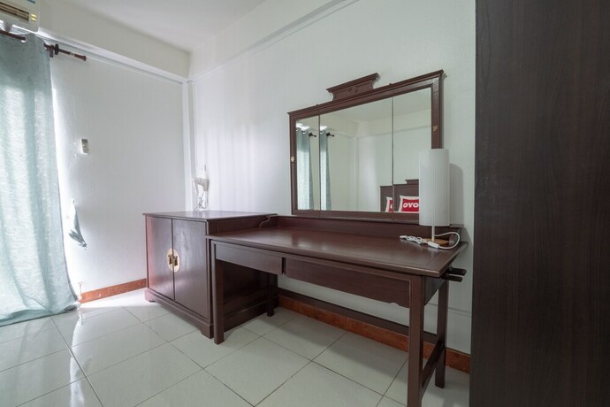 Imagen de la habitación del Hotel OYO 1123 The One Healthcare And Apartment. Foto 8