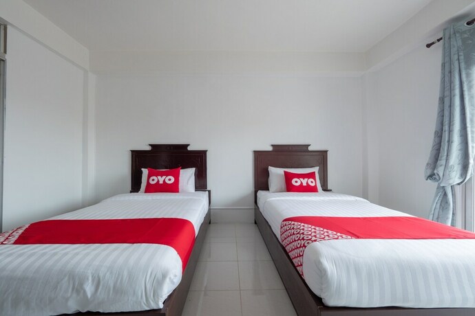 Imagen de la habitación del Hotel OYO 1123 The One Healthcare And Apartment. Foto 9
