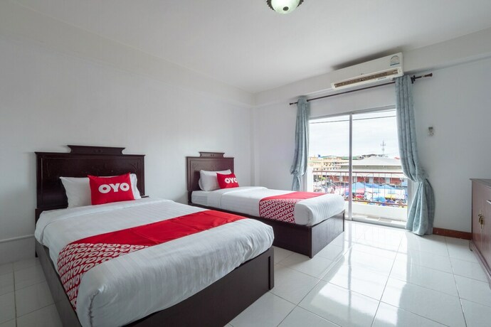 Imagen de la habitación del Hotel OYO 1123 The One Healthcare And Apartment. Foto 11