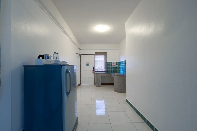 Imagen de la habitación del Hotel OYO 1123 The One Healthcare And Apartment. Foto 14