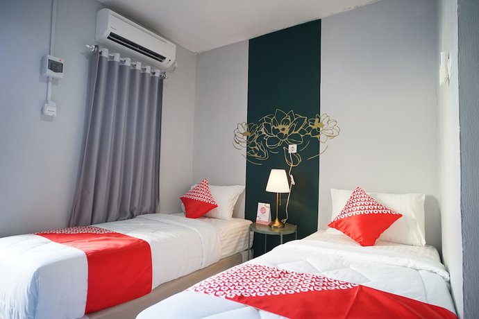 Imagen de la habitación del Hotel OYO 1125 Sani Guest House. Foto 3