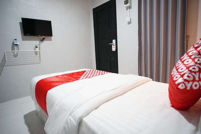 Imagen de la habitación del Hotel OYO 1125 Sani Guest House. Foto 8
