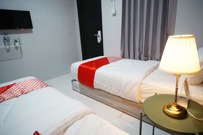Imagen de la habitación del Hotel OYO 1125 Sani Guest House. Foto 10