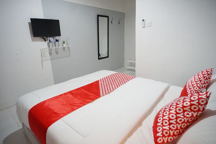 Imagen de la habitación del Hotel OYO 1125 Sani Guest House. Foto 17
