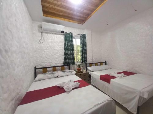 Imagen de la habitación del Hotel OYO 1130 Thrivers Hometel. Foto 19