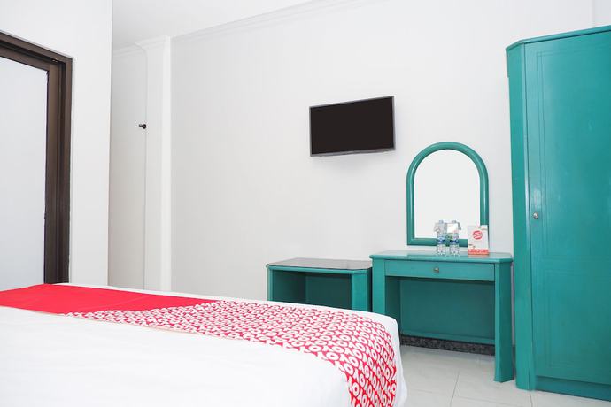 Imagen de la habitación del Hotel OYO 1136 Surya Solo. Foto 2