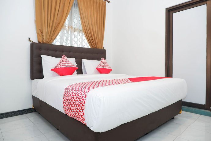 Imagen de la habitación del Hotel OYO 1136 Surya Solo. Foto 4