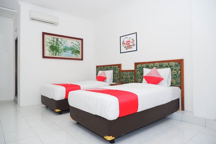 Imagen de la habitación del Hotel OYO 1136 Surya Solo. Foto 6