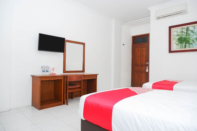 Imagen de la habitación del Hotel OYO 1136 Surya Solo. Foto 10