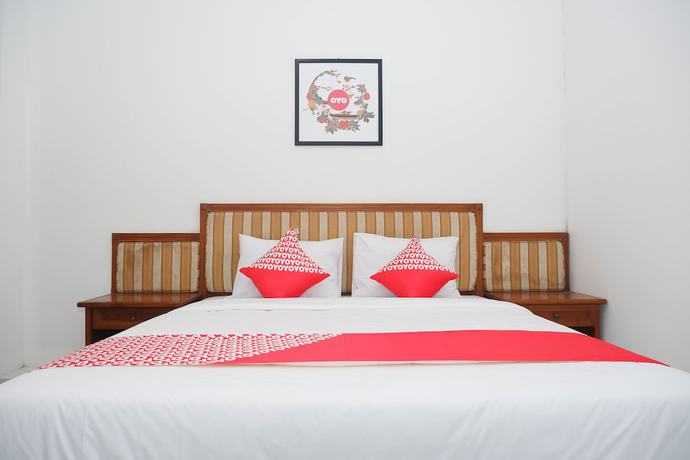 Imagen de la habitación del Hotel OYO 1136 Surya Solo. Foto 12