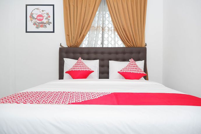 Imagen de la habitación del Hotel OYO 1136 Surya Solo. Foto 13