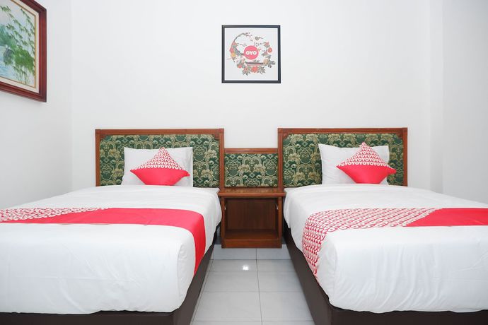 Imagen de la habitación del Hotel OYO 1136 Surya Solo. Foto 14