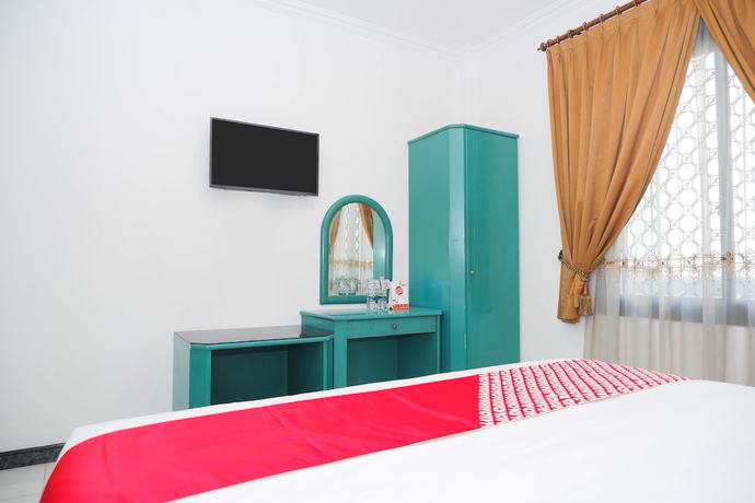 Imagen de la habitación del Hotel OYO 1136 Surya Solo. Foto 16