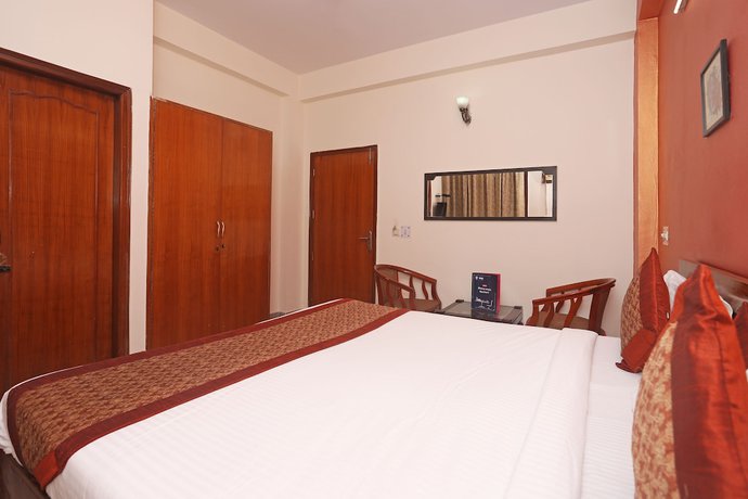 Imagen de la habitación del Hotel OYO 11361 Park Residency. Foto 7