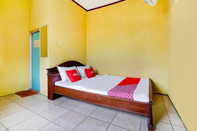 Imagen de la habitación del Hotel OYO 113676 Wisma Al-fahmi Syariah. Foto 4