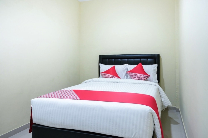 Imagen de la habitación del Hotel OYO 1149 Mustika. Foto 6