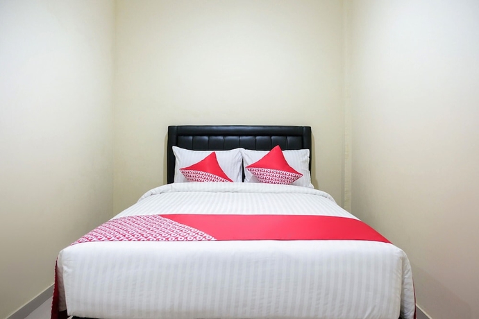 Imagen de la habitación del Hotel OYO 1149 Mustika. Foto 7