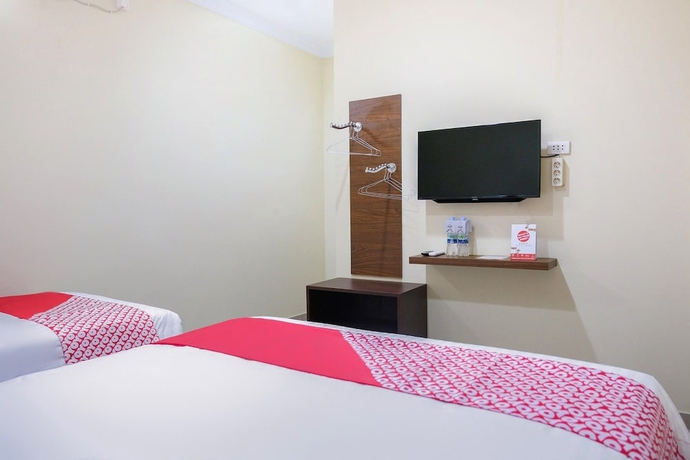 Imagen de la habitación del Hotel OYO 1149 Mustika. Foto 9