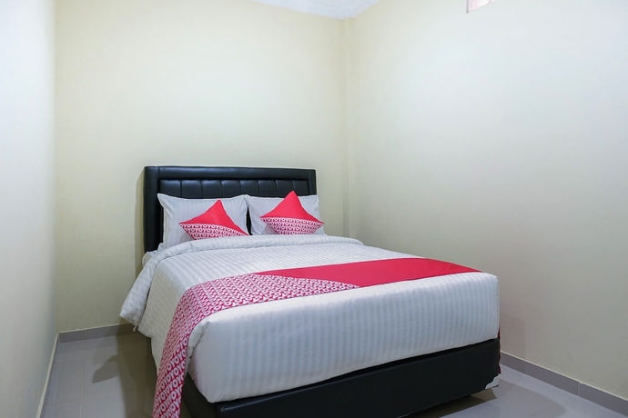 Imagen de la habitación del Hotel OYO 1149 Mustika. Foto 13