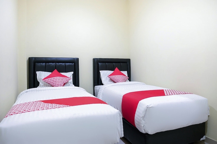 Imagen de la habitación del Hotel OYO 1149 Mustika. Foto 14