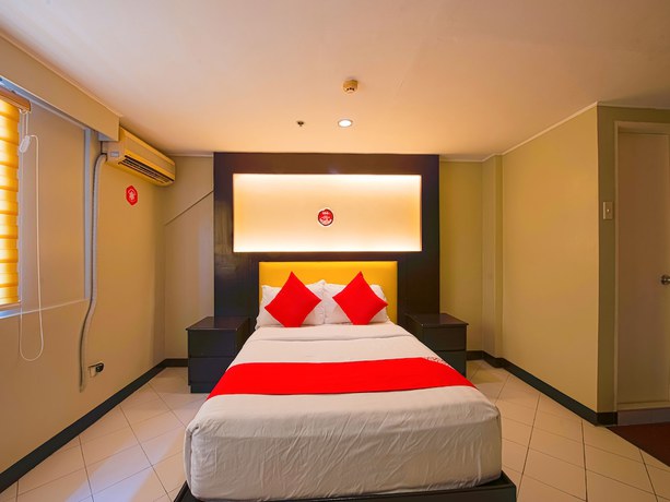 Imagen de la habitación del Hotel OYO 115 Northridge Mansions. Foto 4