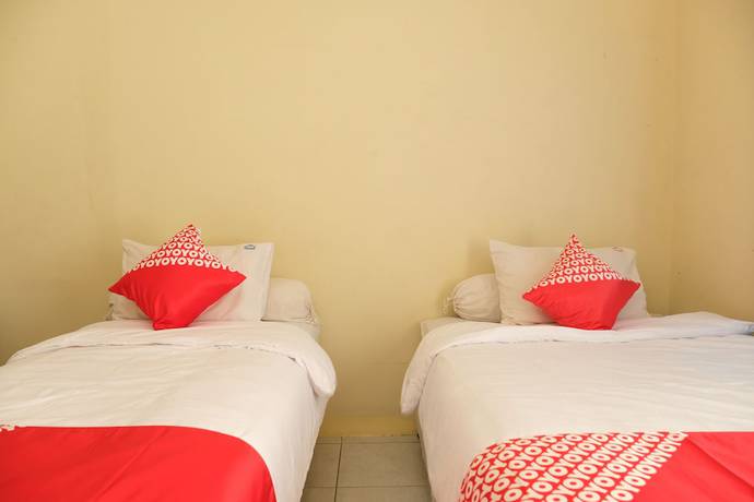 Imagen de la habitación del Hotel OYO 1151 Ww House. Foto 6