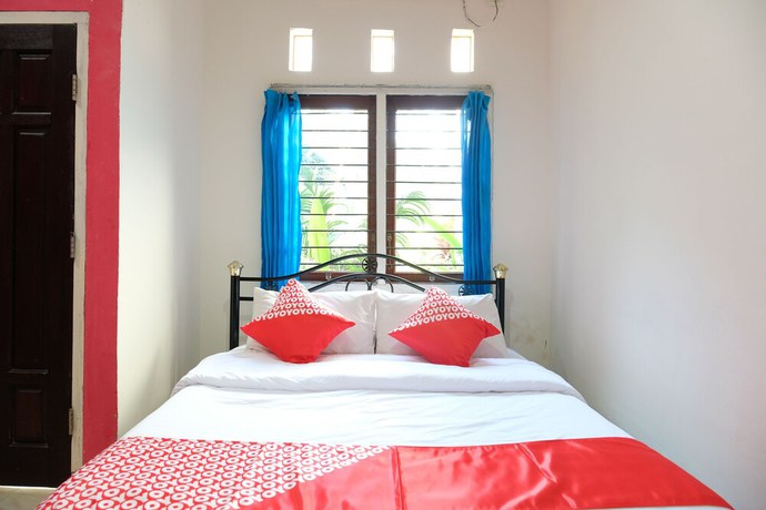 Imagen de la habitación del Hotel OYO 1151 Ww House. Foto 7