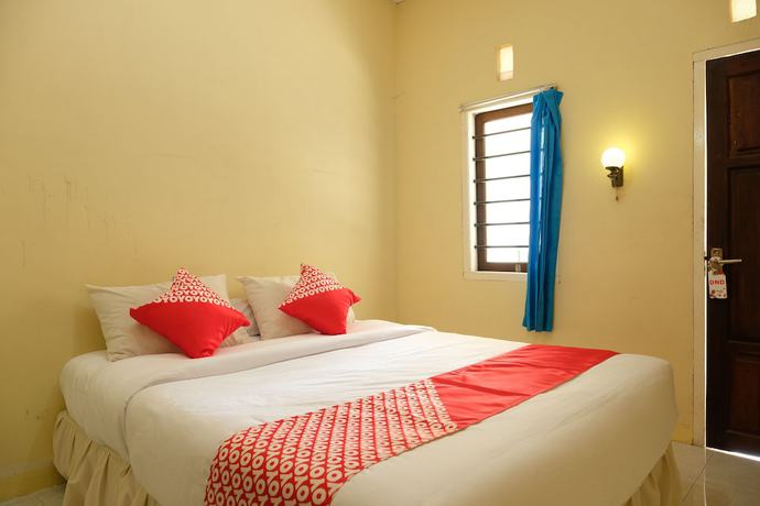 Imagen de la habitación del Hotel OYO 1151 Ww House. Foto 9