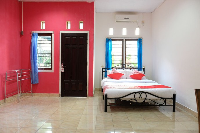 Imagen de la habitación del Hotel OYO 1151 Ww House. Foto 13