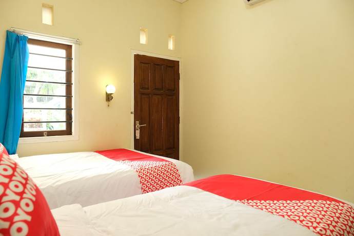 Imagen de la habitación del Hotel OYO 1151 Ww House. Foto 14