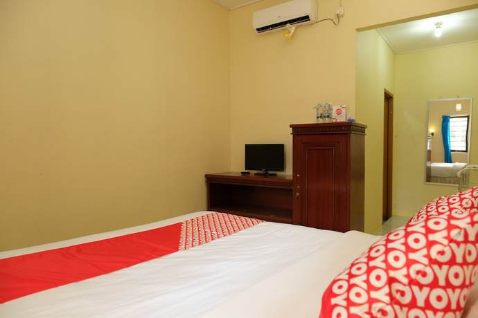 Imagen de la habitación del Hotel OYO 1151 Ww House. Foto 15