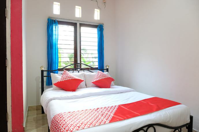 Imagen de la habitación del Hotel OYO 1151 Ww House. Foto 17