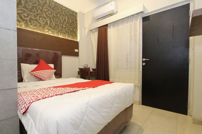 Imagen de la habitación del Hotel OYO 1157 Ant Home. Foto 2