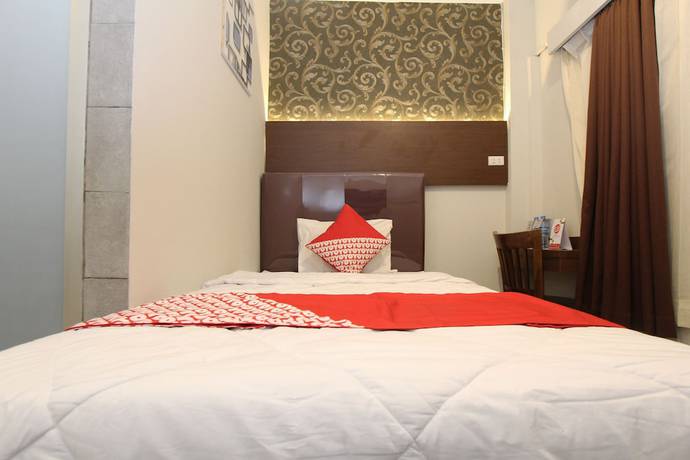 Imagen de la habitación del Hotel OYO 1157 Ant Home. Foto 4