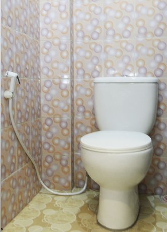 Imagen de la habitación del Hotel OYO 1157 Ant Home. Foto 5