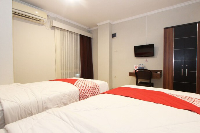 Imagen de la habitación del Hotel OYO 1157 Ant Home. Foto 7