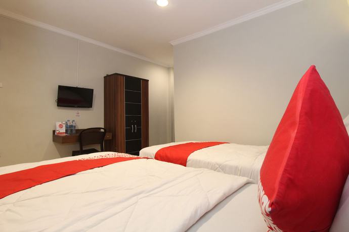 Imagen de la habitación del Hotel OYO 1157 Ant Home. Foto 8