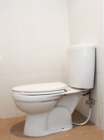 Imagen de la habitación del Hotel OYO 1157 Ant Home. Foto 11