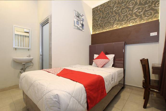 Imagen de la habitación del Hotel OYO 1157 Ant Home. Foto 13