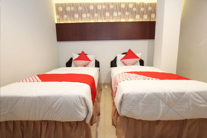Imagen de la habitación del Hotel OYO 1157 Ant Home. Foto 15