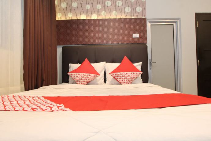 Imagen de la habitación del Hotel OYO 1157 Ant Home. Foto 16