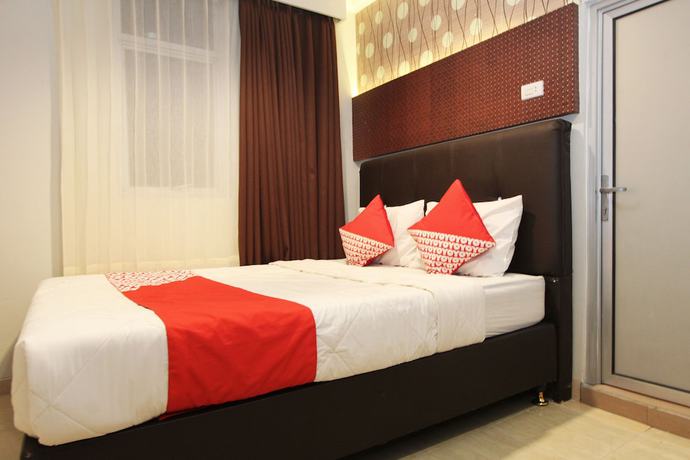 Imagen de la habitación del Hotel OYO 1157 Ant Home. Foto 17