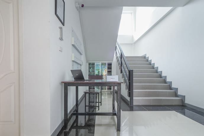 Imagen de los interiores del Hotel OYO 1159 Kandk Apartment. Foto 12