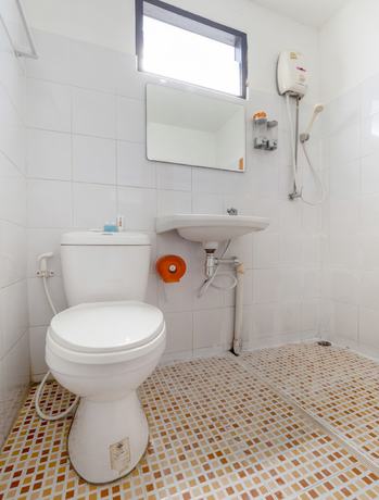 Imagen de la habitación del Hotel OYO 1159 Kandk Apartment. Foto 4